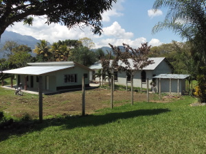 Part of school house and church house to the right.