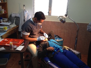 First Dental Brigade at the clinic with volunteer dentist from the area.