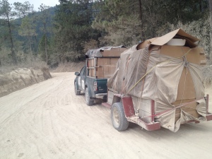 Taking meds to the clinic.  Picture taken after driving for a while on the very dusty road.