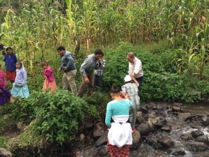 Crossing the creek on our way to the last two houses