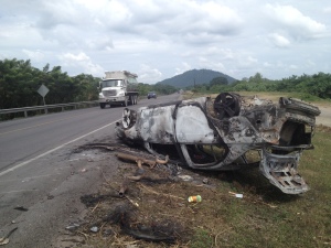 Political Crisis.  The opposition protesters burnt this car and many more...