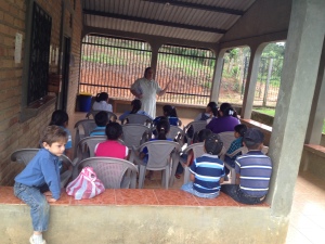 Mom teaching the little ones at the clinic in Carrizal